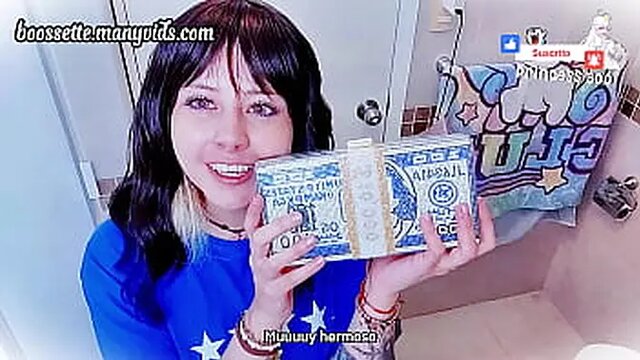 Young Japanese girl in amateur money-themed unboxing video