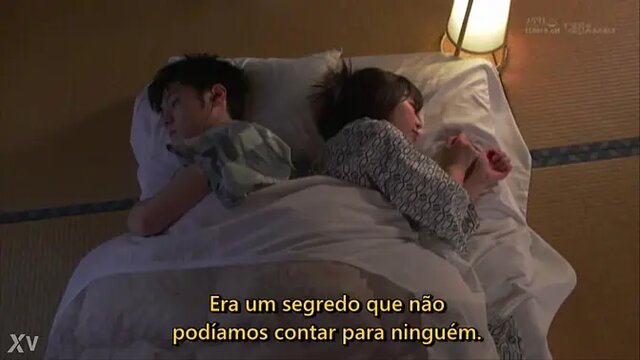 Hachino Tsubasa's sexy Asian MILF chews on giant tits