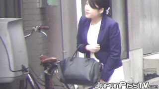 Intimate moment of Japanese girls urinating in a public restroom