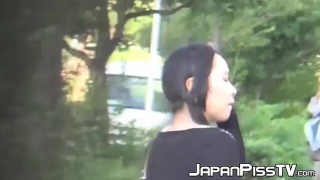 Naughty Japanese girls pee in public in lingerie