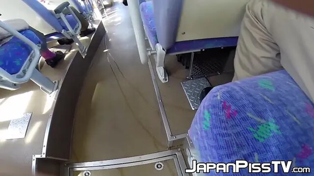 Japanese chick secretly pisses on train while riding