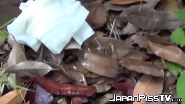 Dark-haired schoolgirl pees in public, caught on cam