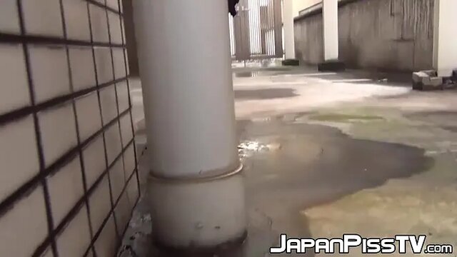 Japanese hottie pisses in public for hidden voyeur camera