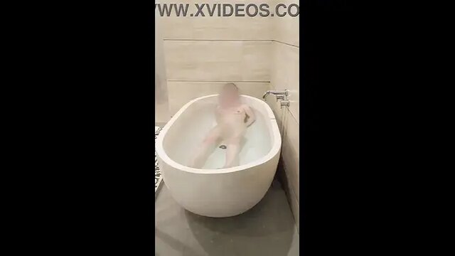 Skinny Japanese college girl bathed by foot worshipper